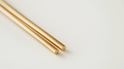 Gold Chopsticks isolated on white background. 
