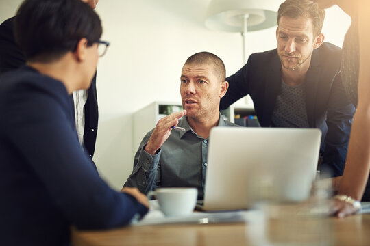 Office, discussion and group with laptop, ambitious and collaboration for project, ideas and confident. Brainstorming, talking and corporate people in meeting, online or actuary for insurance company