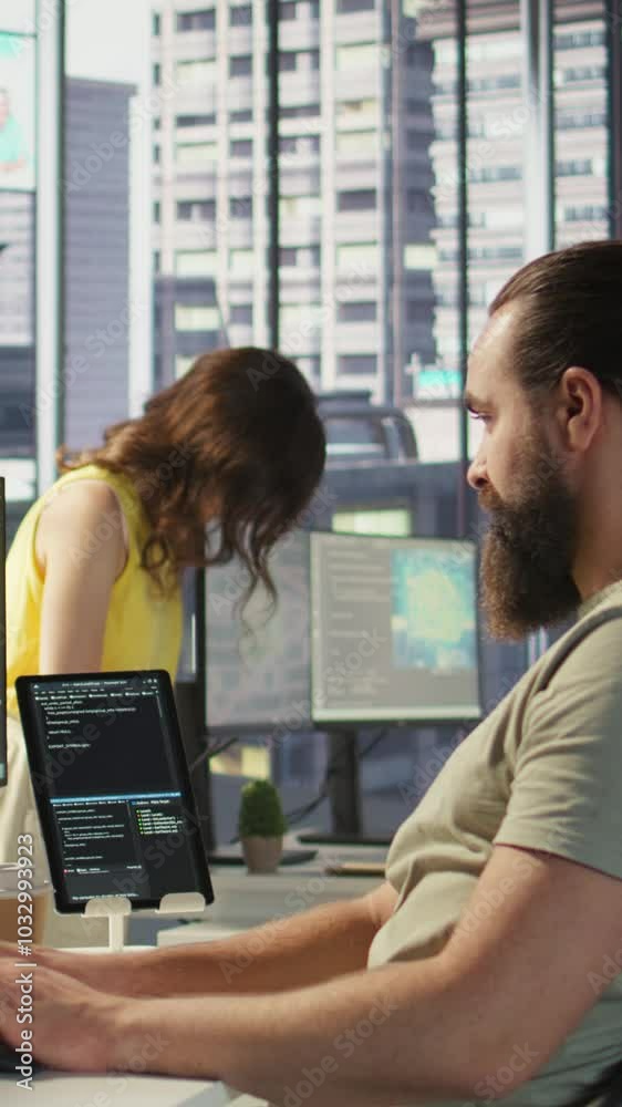 Poster vertical video employee utilizing ai resources and platforms to train and deploy machine learning mo