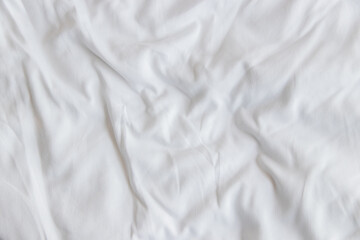 Close up white wrinkled fabric texture rippled surface and background, Soft focus.