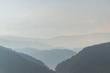 Naklejka premium Beautiful Landscape of mountain layer in evening at Mon Doi Dao, Nan, Thailand.