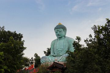 Fototapeta premium The Great Buddha (Daibutsu) at Wat Pra That Doi Pra Chan temple in Mae Tha District, Lampang, Thailand.