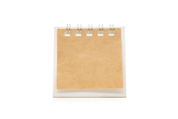 Blank desk calendar isolated on white background. Blank paper desk spiral calendar. Copy Space.