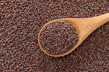 close-up a spoonful of red millet.
