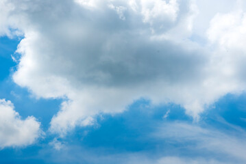 Tropical summer blue sky fluffy white cloud summertime on light sunny day cloudscape. Clear bright blue skyline spring sunlight climate background. Heaven blue environment ecology high scenic nature.