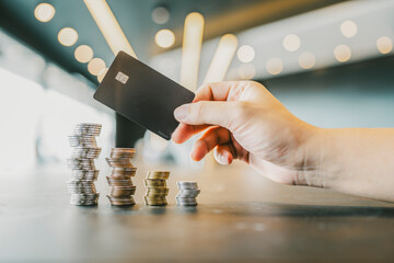 The coins on the table are shuffled back and forth between the left and right, while a...