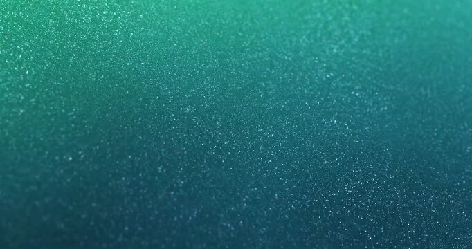  A mesmerizing loop of densely packed turquoise particles, ideal for creating dynamic backgrounds, motion graphics, or adding a visually stimulating element to professional applications