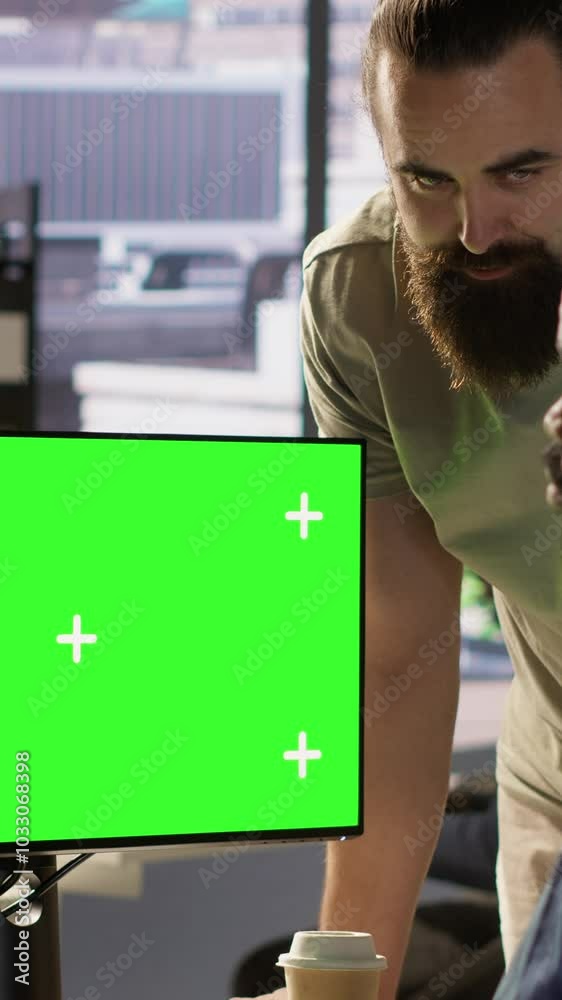 Poster vertical video developer using mockup pc, being assisted by colleague to fix applications issues, de
