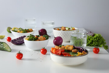 Fried tofu salad in a bowl with vegetables
