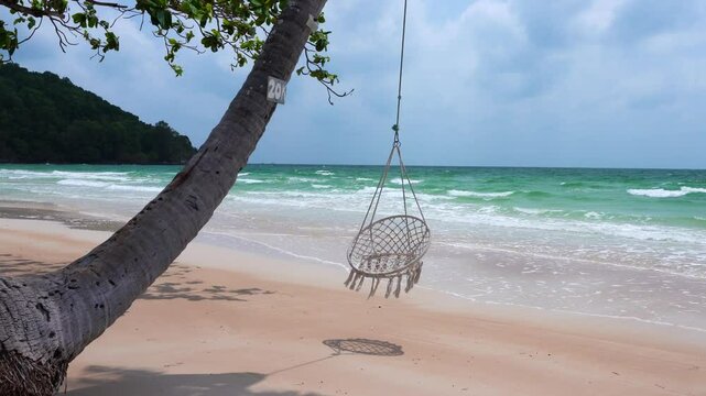 Seascape with tropical palms on beautiful Sao sandy beach in Phu Quoc island, Vietnam