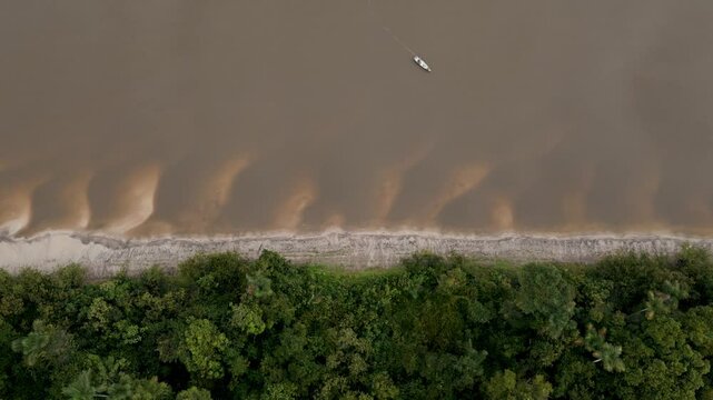 Aerial view of the Amazon rivers of the Peruvian jungle, a drone view of the Amazon rainforest surrounded by water