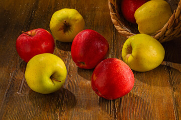 Variety of Fresh Apples on a Rustic Wooden Table