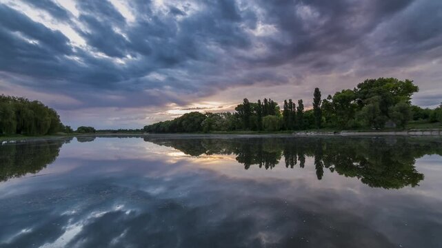 clouds above a lake seamless loop