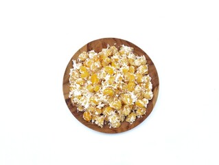 Urab jagung or Indonesian traditional foods Made from boiled corn with grated coconut. famous in West Java, isolated on white background 