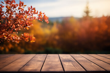 The empty wooden table top with blur background of autumn