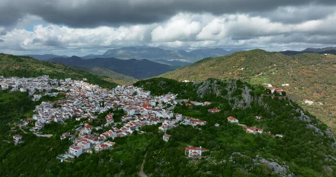 Beautiful cinematic drone view of Gauc&iacute;n City in the mountains of Spain, Europe. Cloud shadows are covering mountains around. Poin of interest camera movement. High quality 4K prores footage.