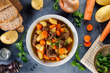 beef stew cooked with carrots, potatoes, herbs and broth