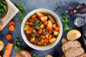 beef stew cooked with carrots, potatoes, herbs and broth