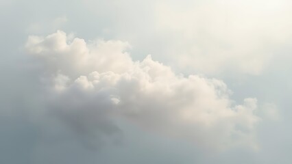 Obraz premium A serene cloudscape featuring soft, fluffy clouds against a pale blue sky, perfect for backgrounds, nature themes, and tranquil design projects.