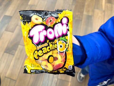 Pouch of Trolli peach rings chewy candy.