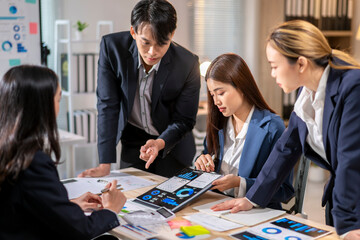 They are discussing the presentation and pointing out important information