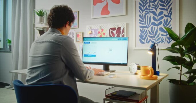 Young man types prompt in artificial intelligence software using computer. AI image generator creates detailed photo of puppies on PC. From text prompt to realistic generated image. Automated artwork.