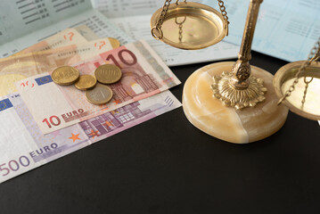 banking and finance or financial law concept. scales of justice and euro money on passbook account...