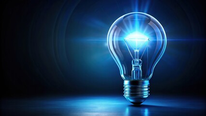 Abstract blue glowing light bulb on dark background