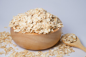 oatmeal in a wooden spoon