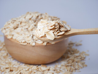 oatmeal in a wooden spoon