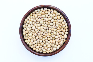 Soybean seeds in a wooden bowl top view 