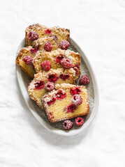 Raspberry cake is a delicious summer dessert on a light background, top view