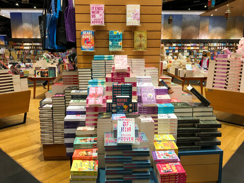 Close-up of displayed books in Kinokuniya Dubai bookstore, United Arab Emirates.