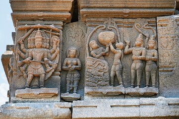 Carved idols on the outer wall of an old temple, near Palasdev Temple, Ujani Dam, Maharashtra, India