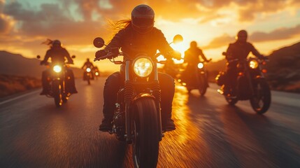 Fototapeta premium Vintage-Style Photo of a Biker Gang Riding on a Mountain Highway at Sunset