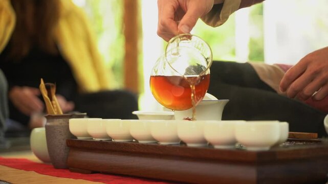 Tea ceremony. Chinese Tea Tasting Ceremony with Master. Traditional Chinese Hot Drink