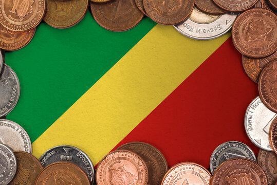 Coins on flag of Republic of the Congo . trading investment business currency concept
