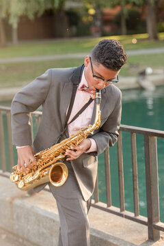 Young boy playing the saxophone