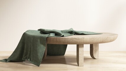 Round wooden podium table with green throw blanket in sunlight on white wall for luxury, elegant...