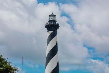 Tourists at the The Cape Hatteras Lighthouse, Buxton, North Carolina, United States.