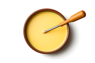 Pot of delicious cheese fondue top view isolated on white background