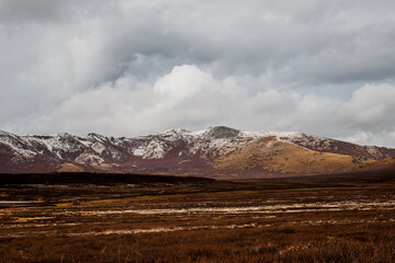 the autumn plateau of Yeshtykol in Altai, dusted with the first snow