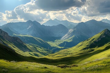 A panoramic view of a mountain range with rolling green hills and a valley in the distance. The sun is shining brightly and there are fluffy clouds in the sky.