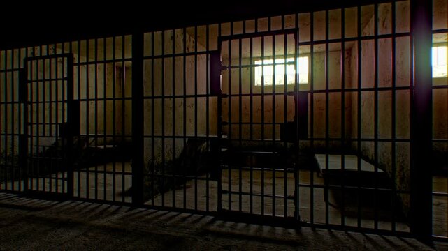 A sparse prison cell symbolizes the long-term consequences of a court sentence. The concept captures the harsh reality of incarceration in a minimalistic space.