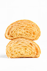 Cut in Half Croissant with Inside Texture and Thin Crisp Layers. Delicious French Pastry. Light background.