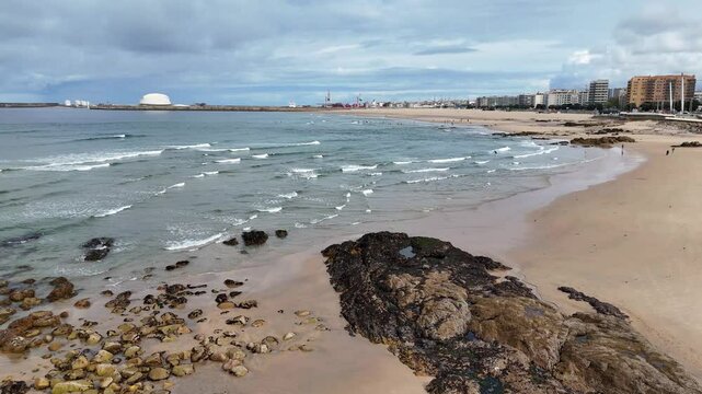 Portugal beach - an aerial shot of the sandy Matosinhos beach at the Atlantic Ocean.