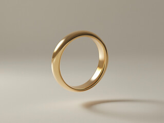 Golden wedding ring floating in the air isolated on grey background