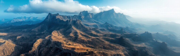 Majestic Mountain Range with Cloud Cover