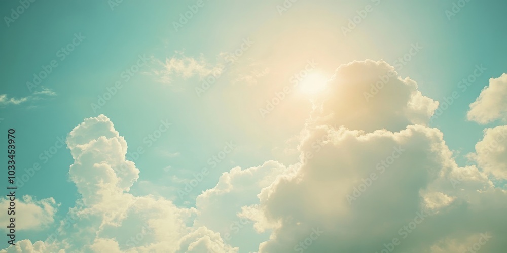 Aufkleber fluffy clouds under the sun in the sky, softly blurred. a serene clouds backdrop on a summer day. re