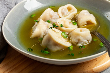 Cappelletti with meat in chicken broth, ravioli with meat, homemade, no people,